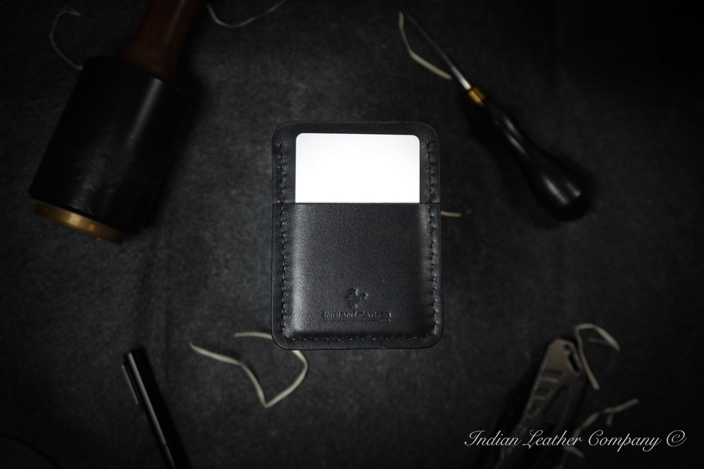 The Explorer wallet, crafted from rich Black-colored full grain Veg tanned Leather. This rugged yet refined accessory features four spacious pockets to keep your essentials organized