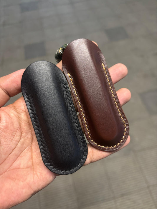 Pioneer Elite leather knife sheaths comparison - Latigo brown and black leather covers with Victorinox knives
