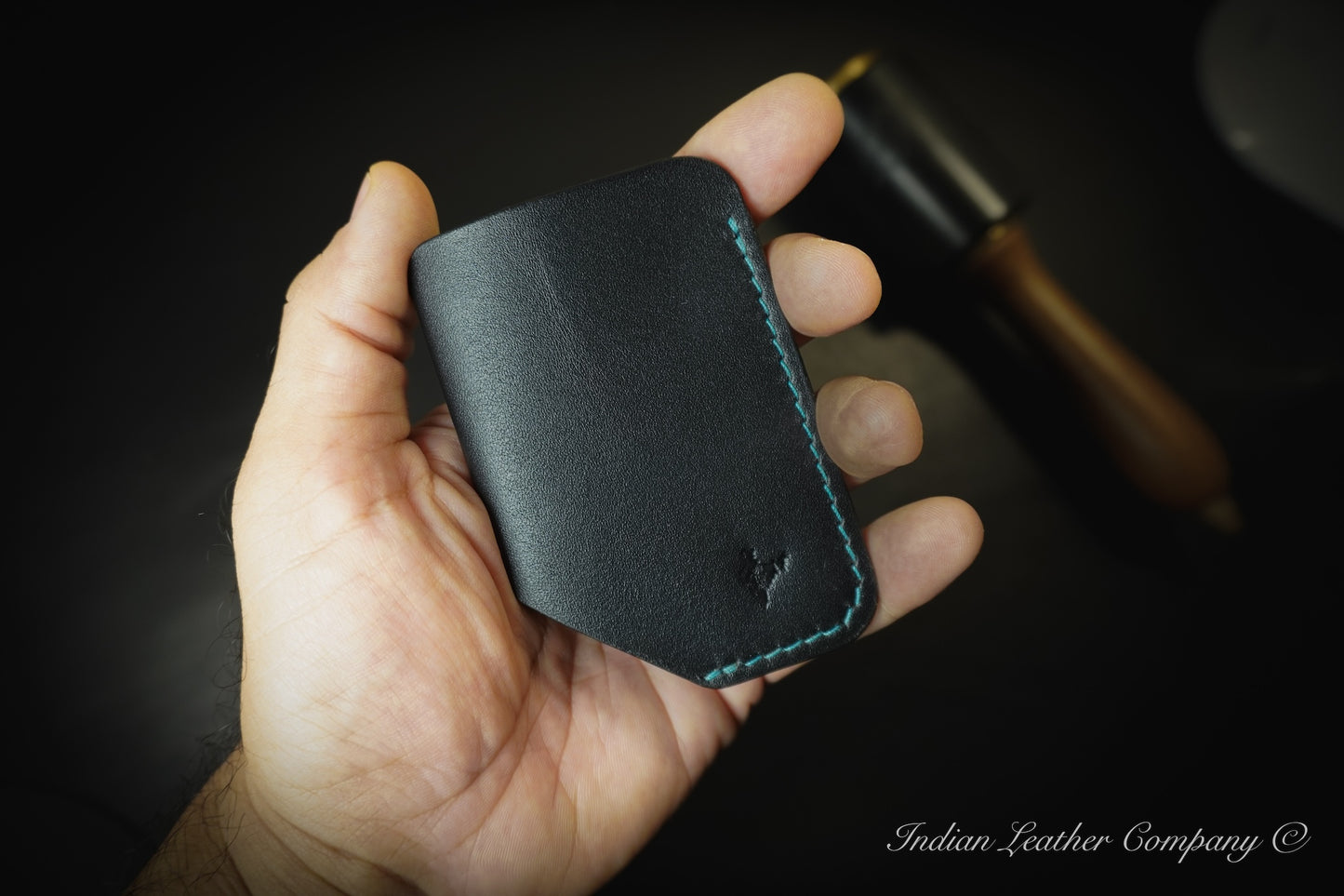 Black full-grain veg-tanned leather wallet from Indian leather company