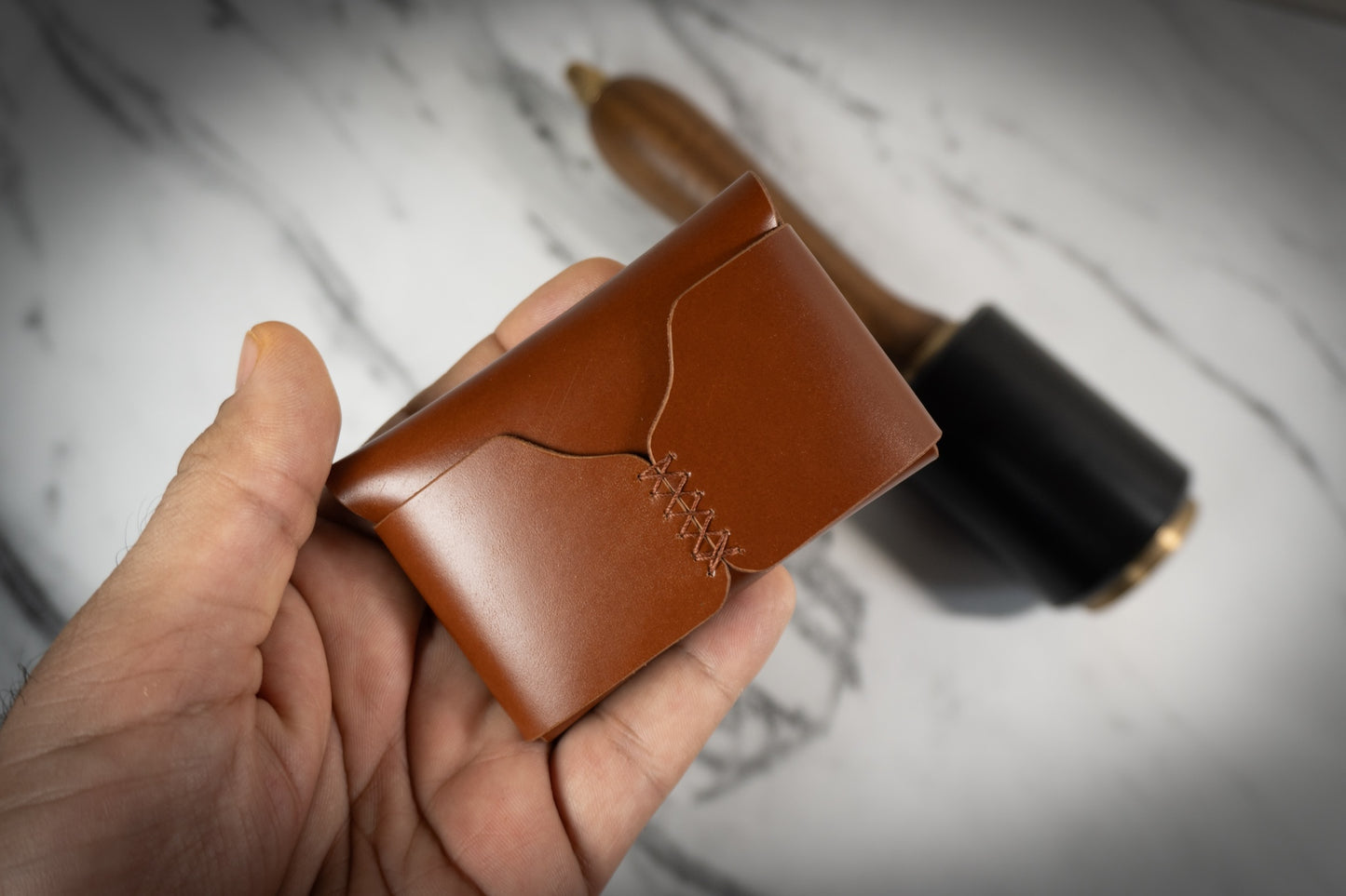 Corsair Wallet by DS Leather Goods and Indian Leather Company crafted from full grain vegetable-tanned leather, showcasing its minimalist front design.