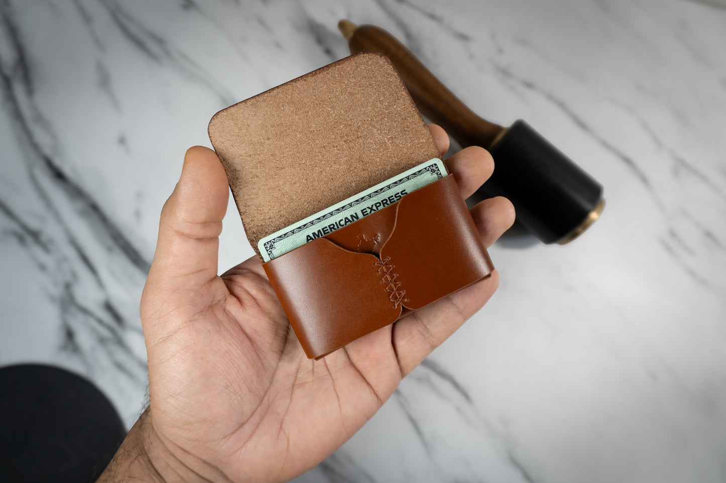 Corsair Wallet by DS Leather Goods and Indian Leather Company crafted from full grain vegetable-tanned leather, holding multiple cards, demonstrating its capacity and compact size perfect for front pocket carry