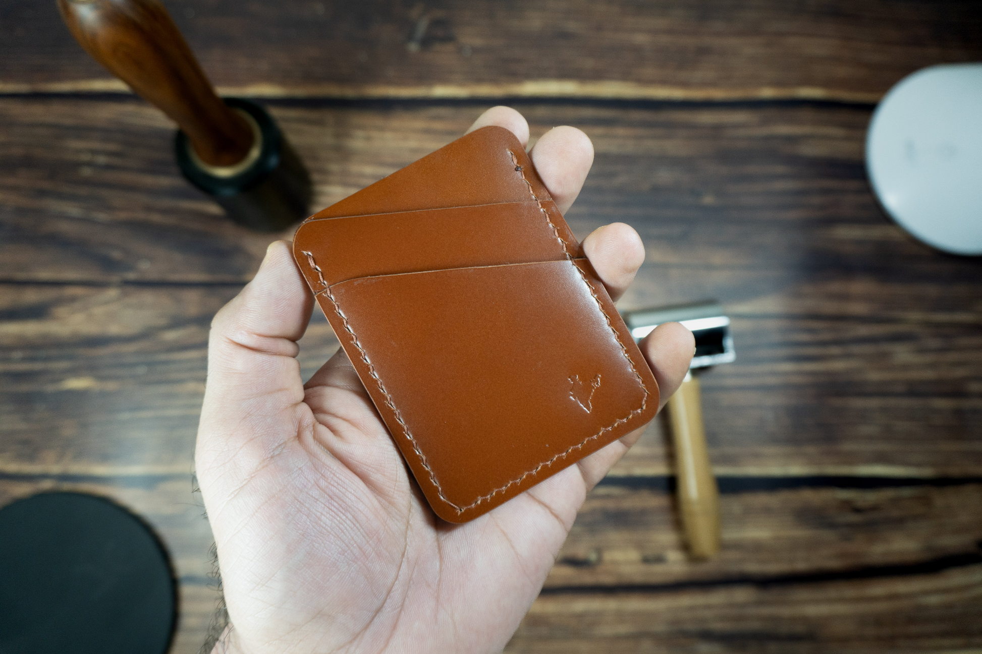 Explore the world with confidence and style using the Explorer wallet, crafted from rich tan-colored Veg tanned Italian Leather. This rugged yet refined accessory features four spacious pockets to keep your essentials organized, making it perfect for both outdoor enthusiasts and those who appreciate a touch of sophistication in their everyday carry